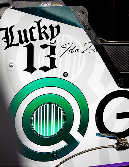 Close-up of the GlobalSKU mark on the dragster bodywork beside the Lucky 13 lettering